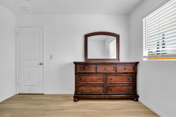 a view of entryway with wooden floor