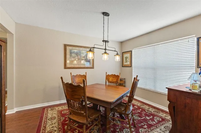 a kitchen with sink cabinets and window