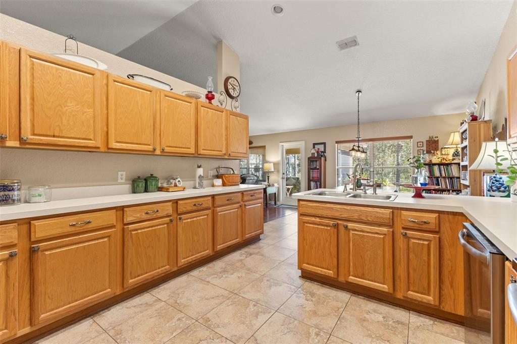 5 Boxleaf Court Homosassa, FL 34446 - Photo 20 of 58 a kitchen with cabinets and appliances