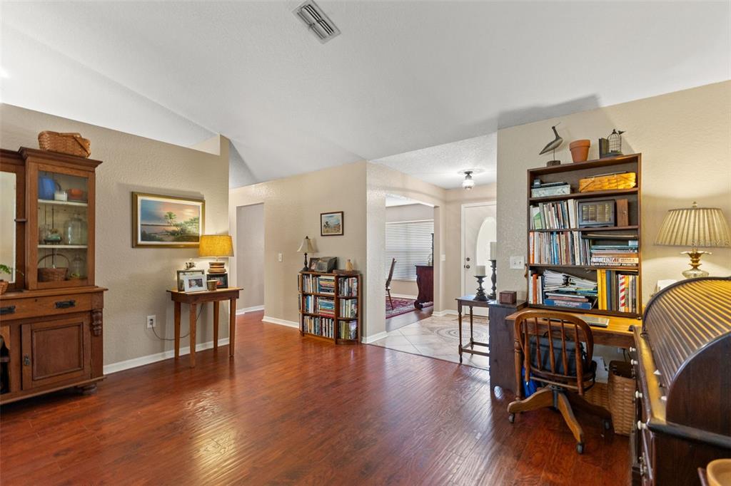 5 Boxleaf Court Homosassa, FL 34446 - Photo 25 of 58 a living room with furniture and wooden floor
