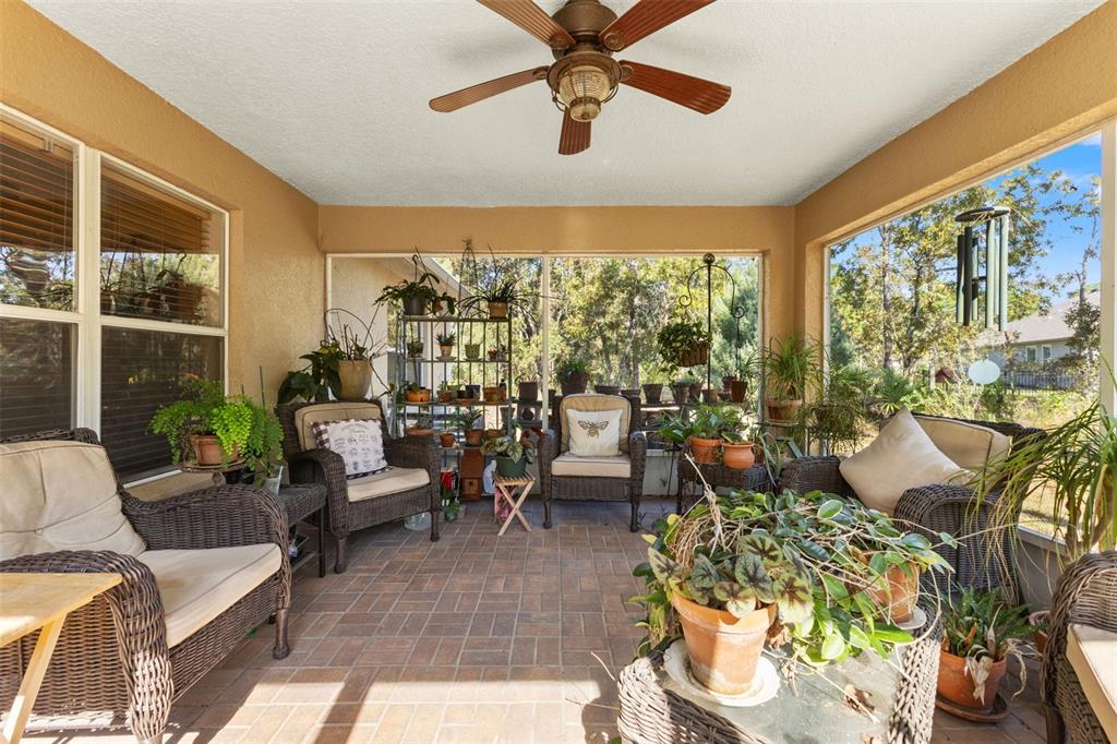 5 Boxleaf Court Homosassa, FL 34446 - Photo 26 of 58 a living room with furniture and a large window