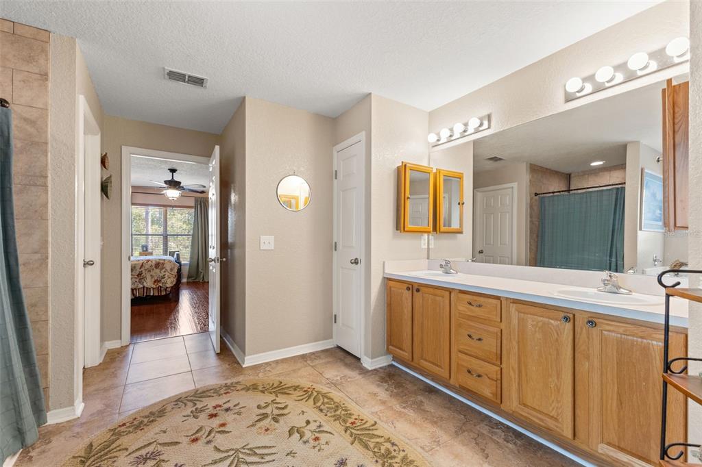 5 Boxleaf Court Homosassa, FL 34446 - Photo 29 of 58 a bathroom with a sink and a mirror