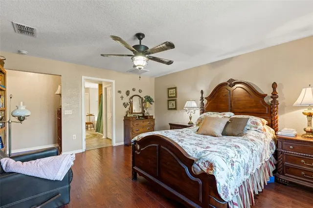 a bedroom with furniture and a window