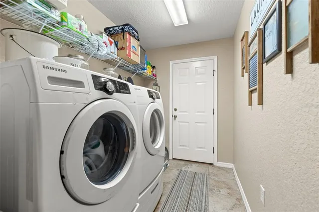 a view of a garden with an outdoor seating