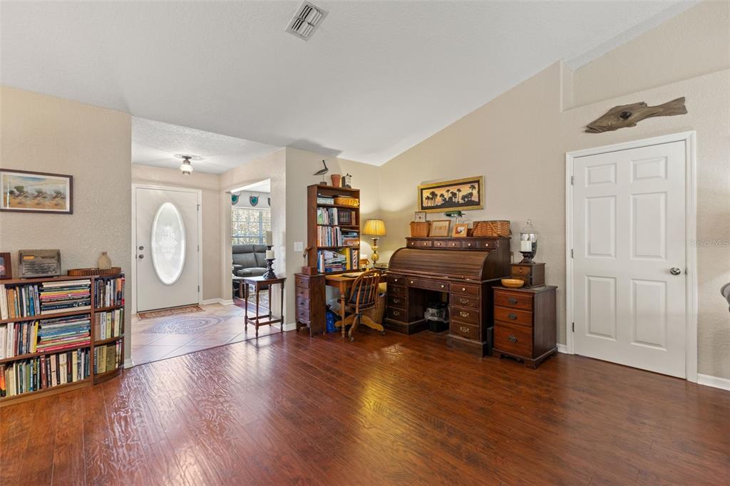 5 Boxleaf Court Homosassa, FL 34446 - Photo 7 of 58 a view of a livingroom with furniture and wooden floor
