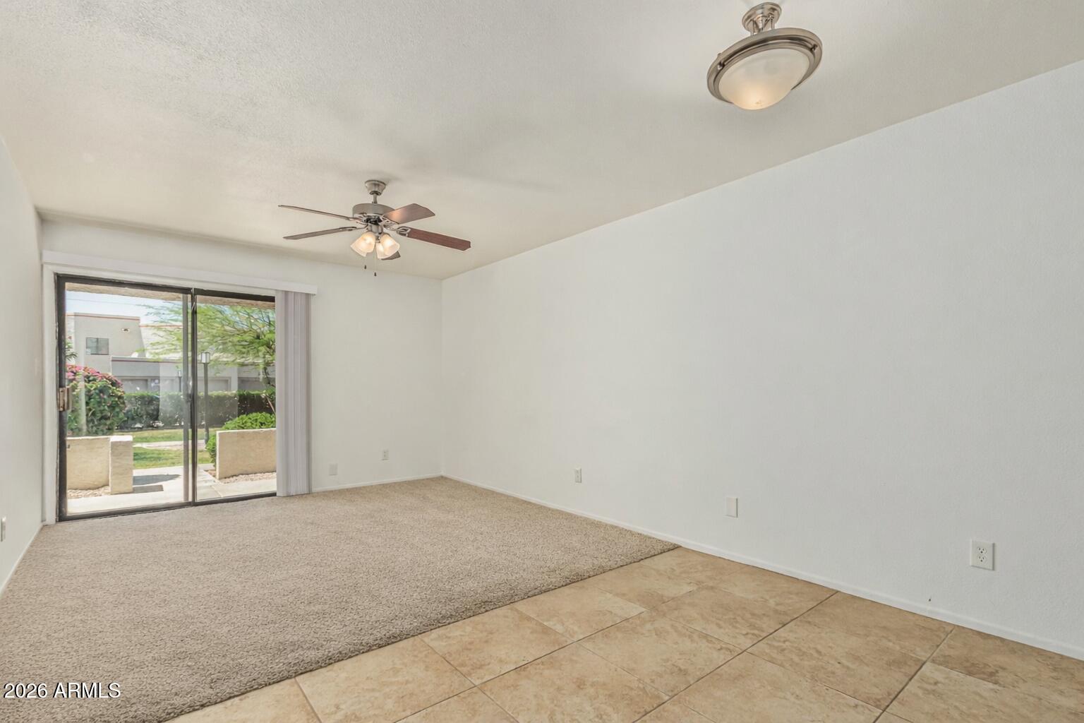 985 North Granite Reef Road, Unit 129 Scottsdale, AZ 85257 - Photo 11 of 38 a view of a room with a large window