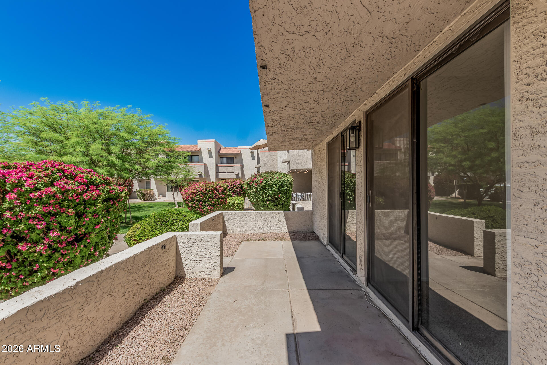 985 North Granite Reef Road, Unit 129 Scottsdale, AZ 85257 - Photo 6 of 38 a view of a building from a balcony