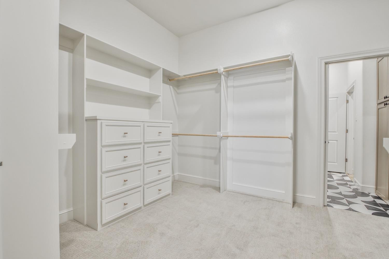 7616 53rd Street Lubbock, TX 79407 - Photo 20 of 50 a view of an empty walk in closet