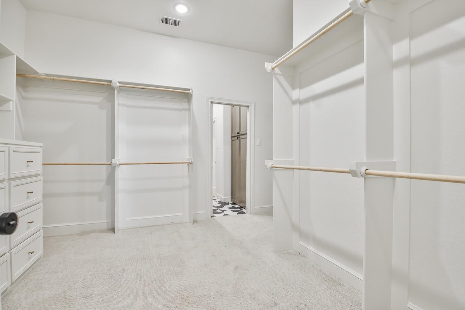 7616 53rd Street Lubbock, TX 79407 - Photo 21 of 50 a view of an empty walk in closet
