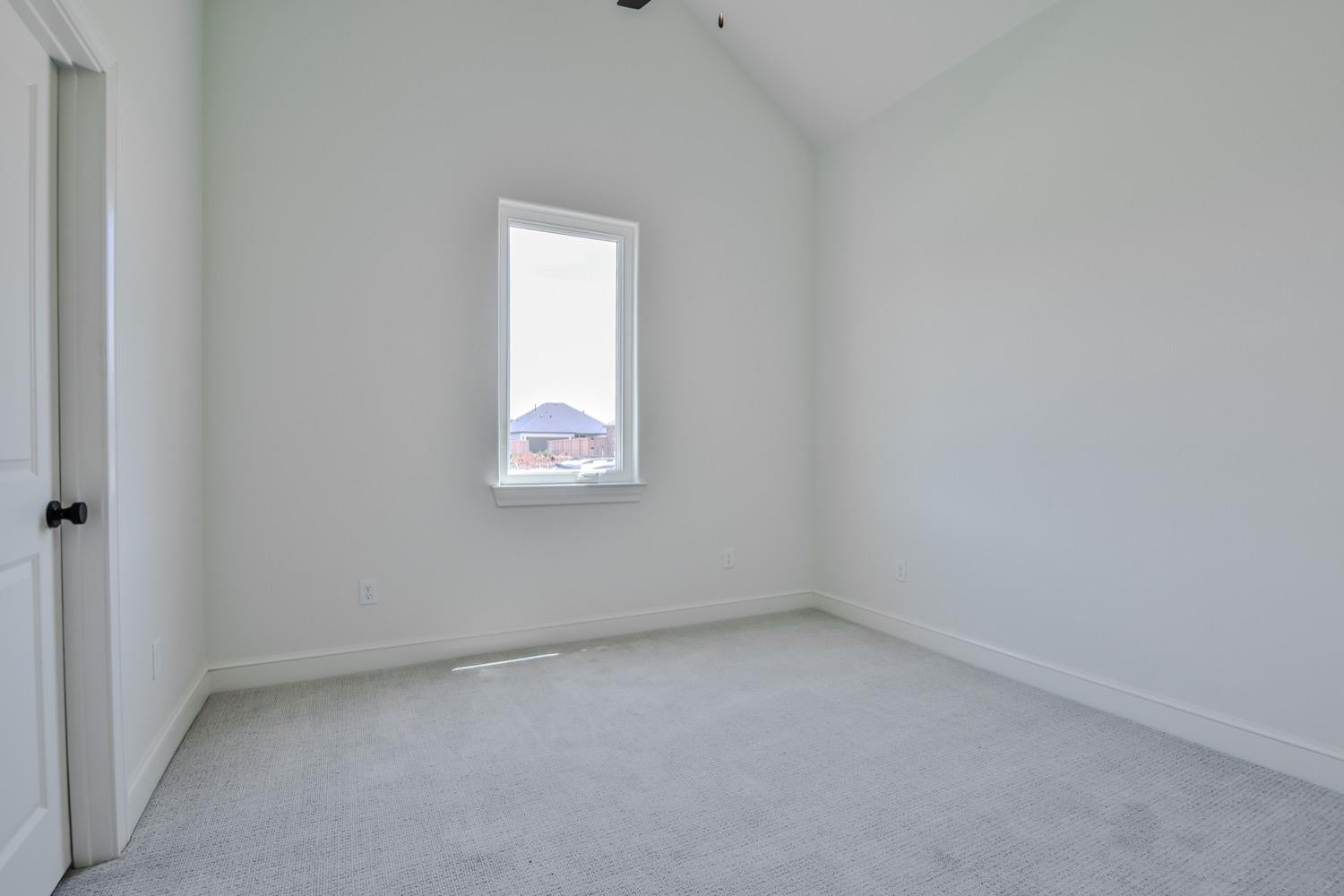 7616 53rd Street Lubbock, TX 79407 - Photo 33 of 50 an empty room with a window