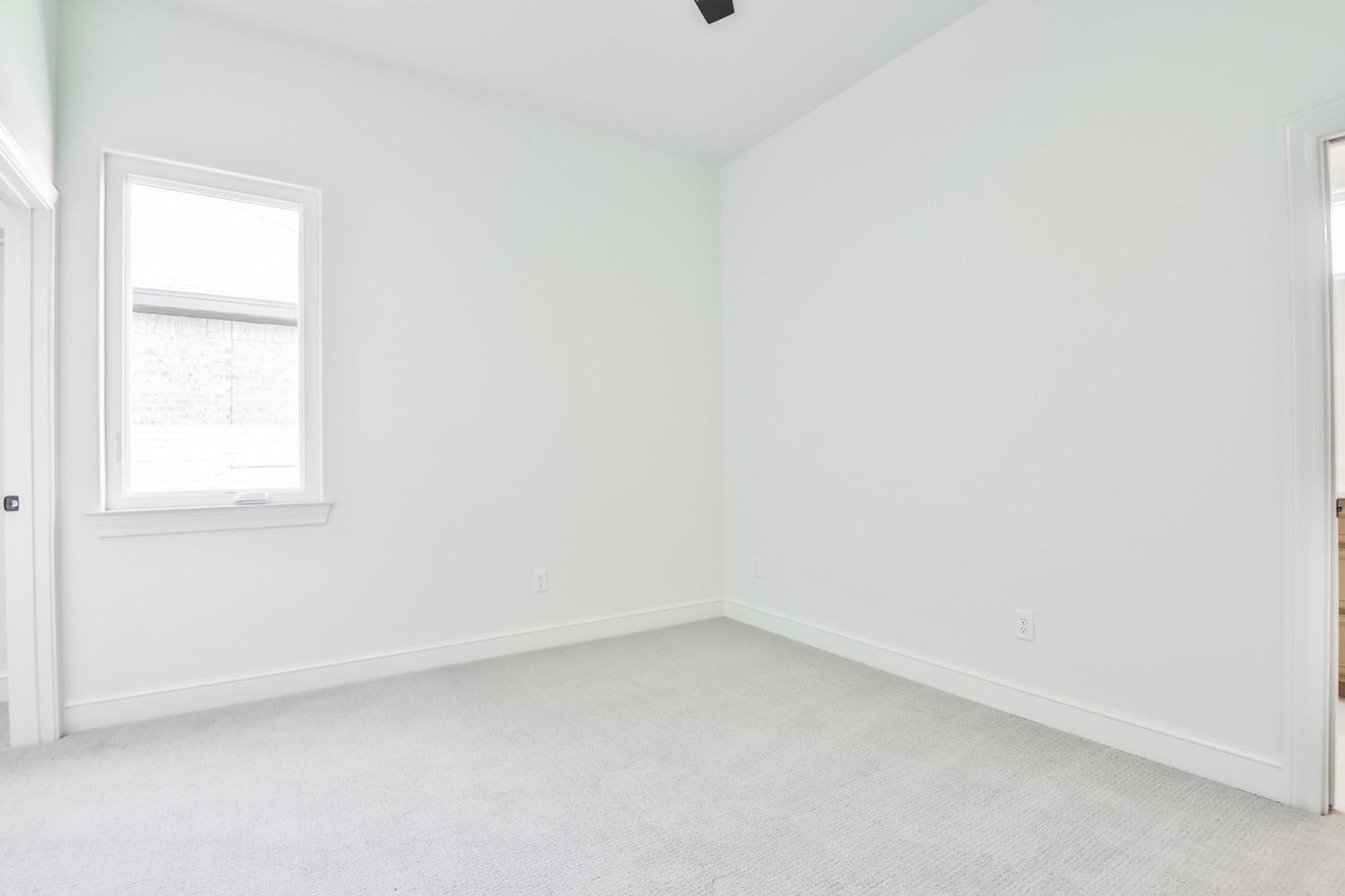 7616 53rd Street Lubbock, TX 79407 - Photo 43 of 50 an empty room with a window