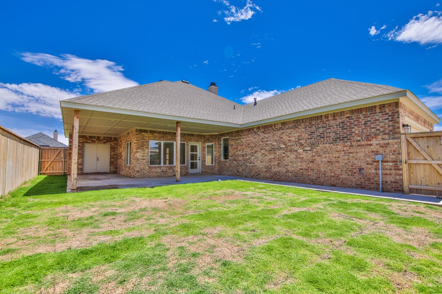 7616 53rd Street Lubbock, TX 79407 - Photo 50 of 50 a view of a house with a yard