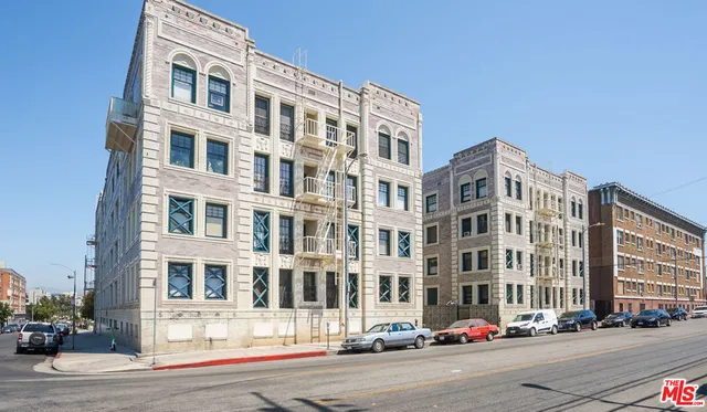 a front view of a building with street view