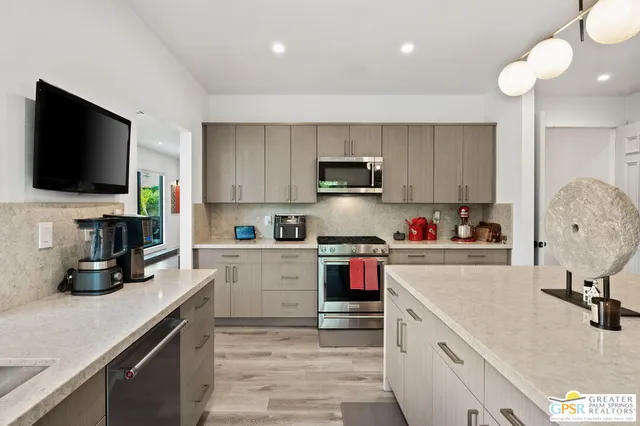 a bedroom with a bed and a chair