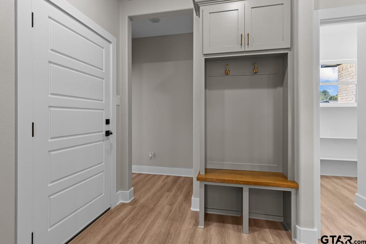 2903 Queens Way West Marshall, TX 75672 - Photo 12 of 17 a view of walk in closet with empty racks