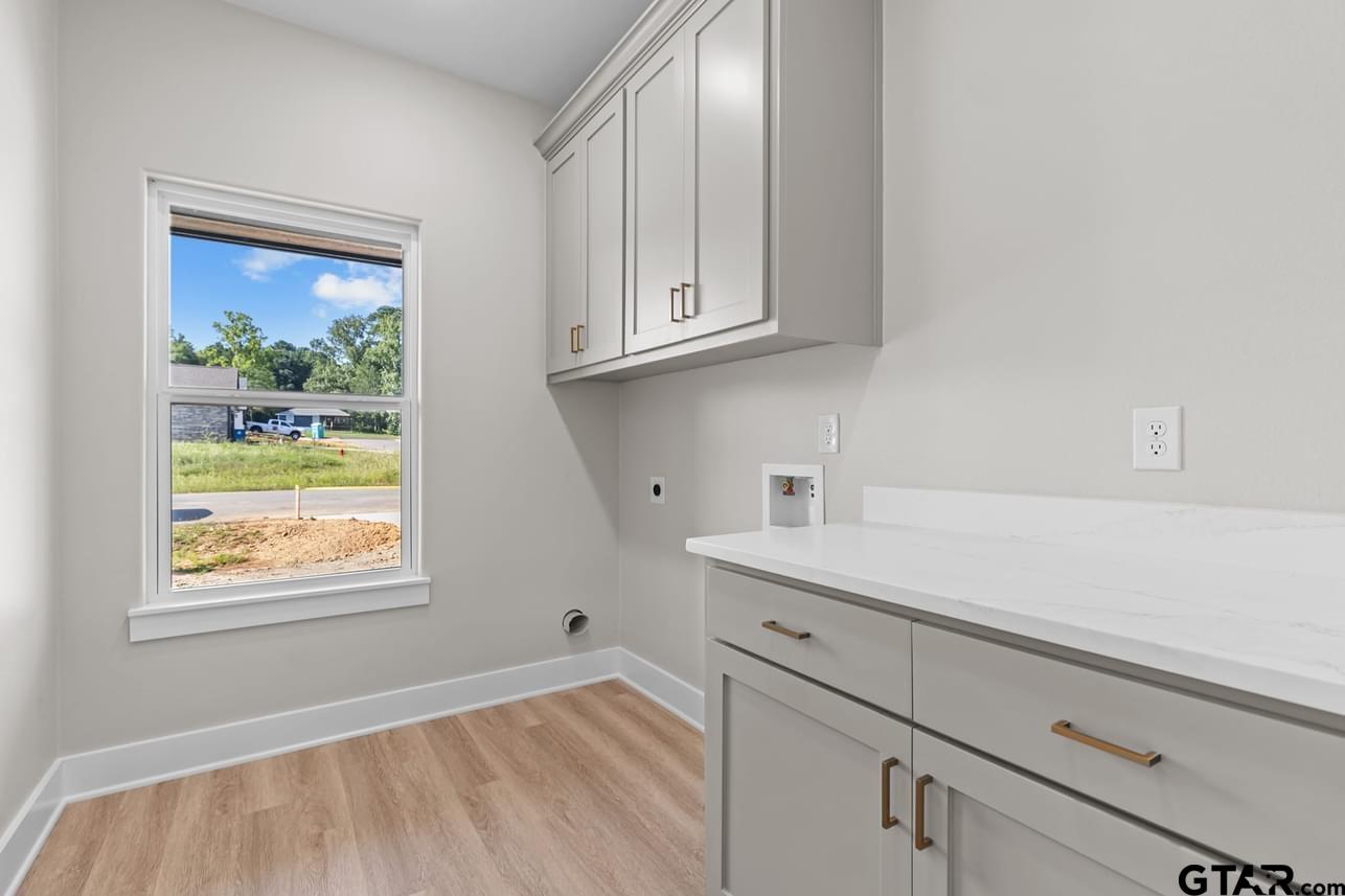 2903 Queens Way West Marshall, TX 75672 - Photo 13 of 17 a view of kitchen with window and cabinets