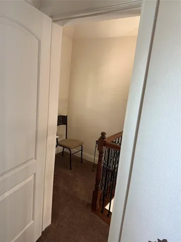 a view of a hallway with workspace