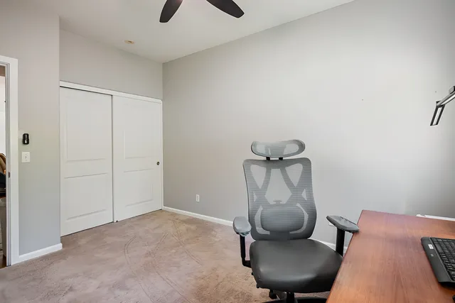 a view of a livingroom with furniture