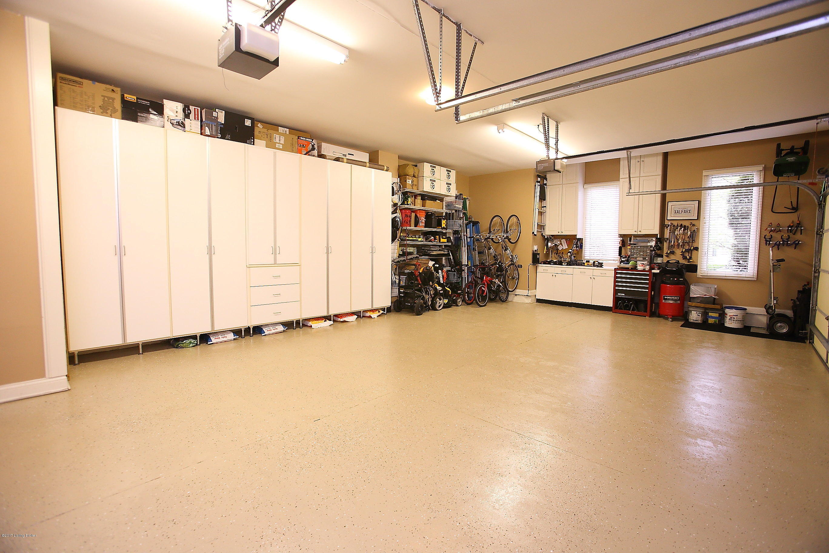 6307 Walnut Ridge Trail Prospect, KY 40059 - Photo 35 of 36 Huge 3 car garage with refinished floor and custom cabinets