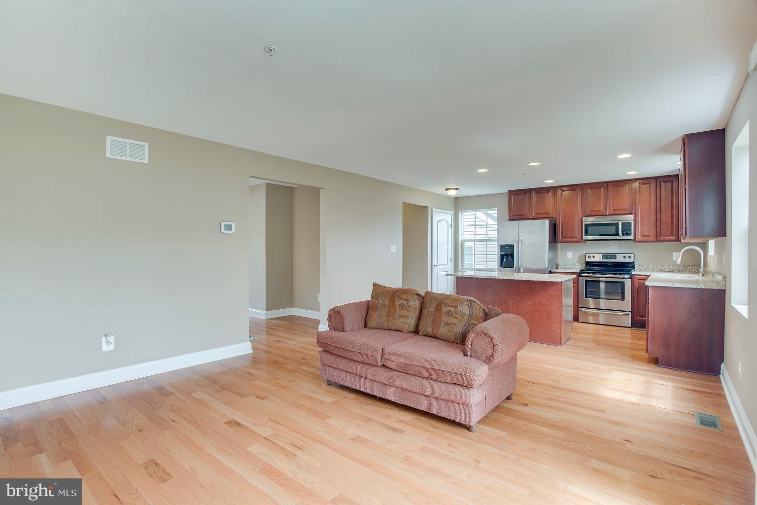2815 Virginia Avenue Halethorpe, MD 21227 - Photo 21 of 44 Family room open to kitchen