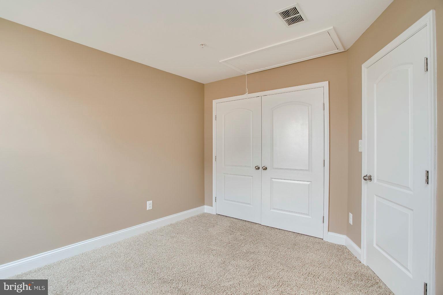 2815 Virginia Avenue Halethorpe, MD 21227 - Photo 39 of 44 bedroom 2 with attic access