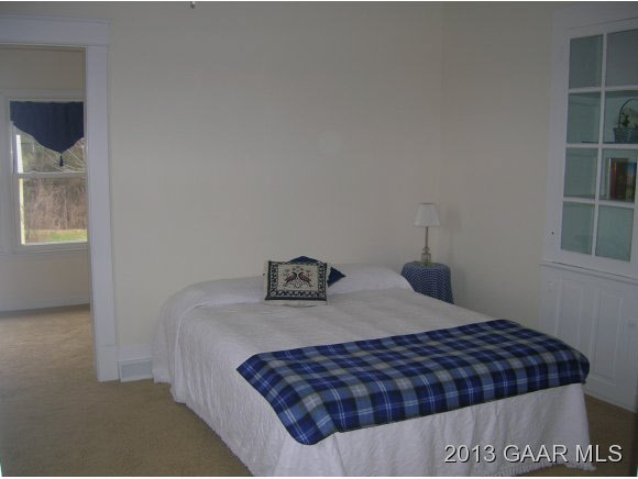 531 Steeles Fort Road Raphine, VA 24472 - Photo 9 of 16 a bedroom with a bed and closet