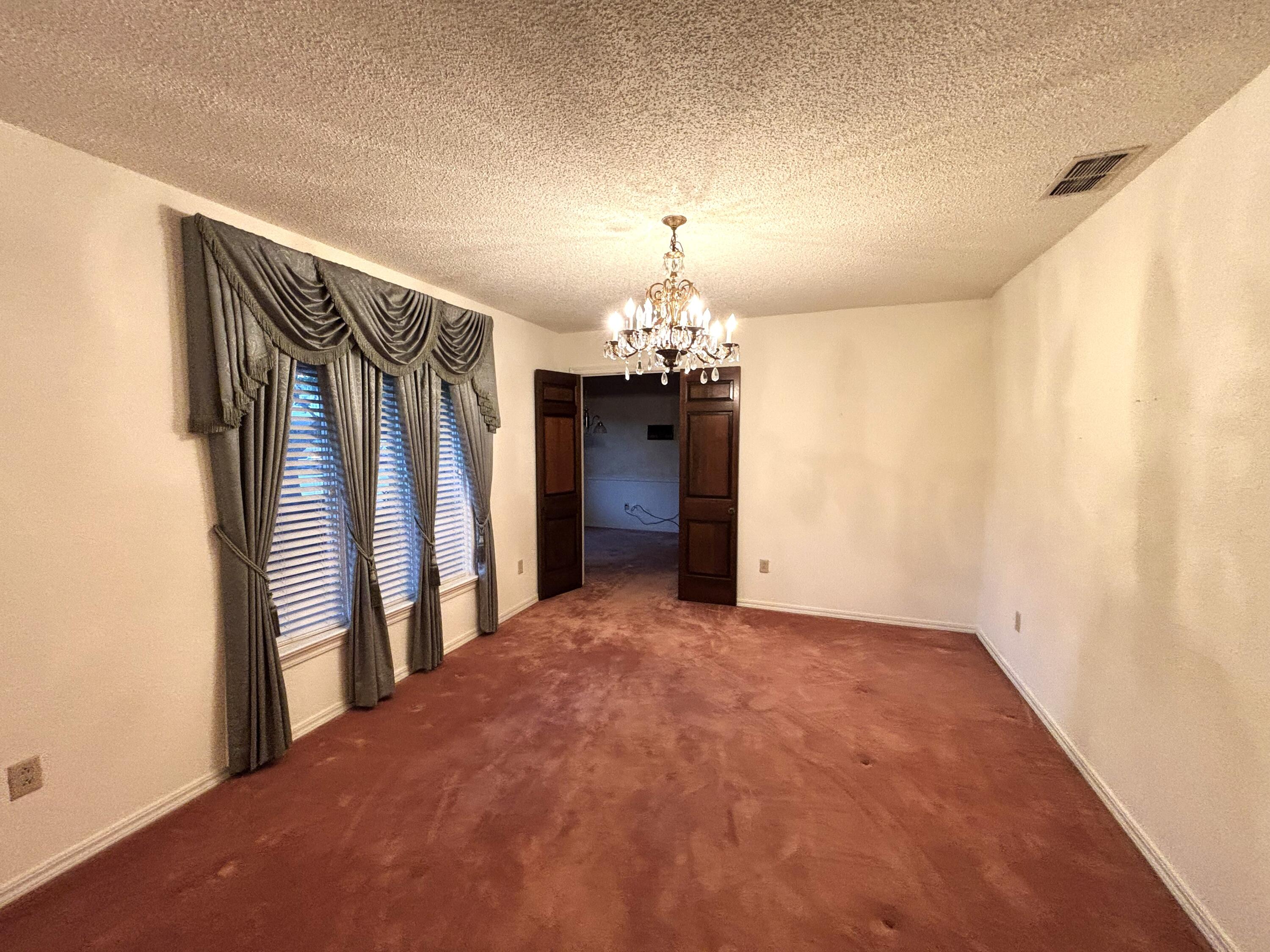 3004 80th Street Lubbock, TX 79423 - Photo 3 of 29 front living/diningIMG_0860