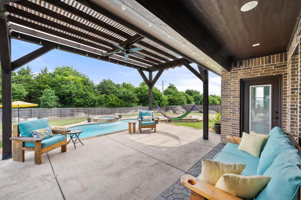 445 Rusty Run Drive Midlothian, TX 76065 - Photo 33 of 40 a view of swimming pool with outdoor seating
