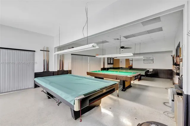 a bedroom with furniture and natural light