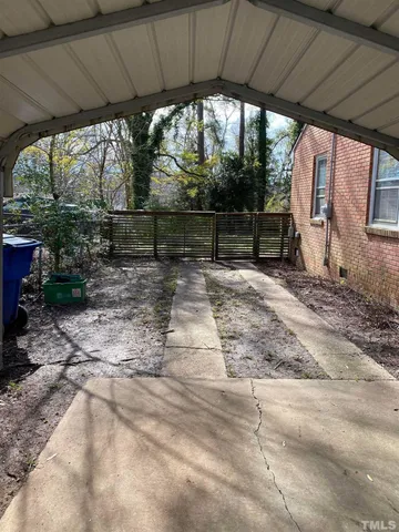 a view of backyard with green space