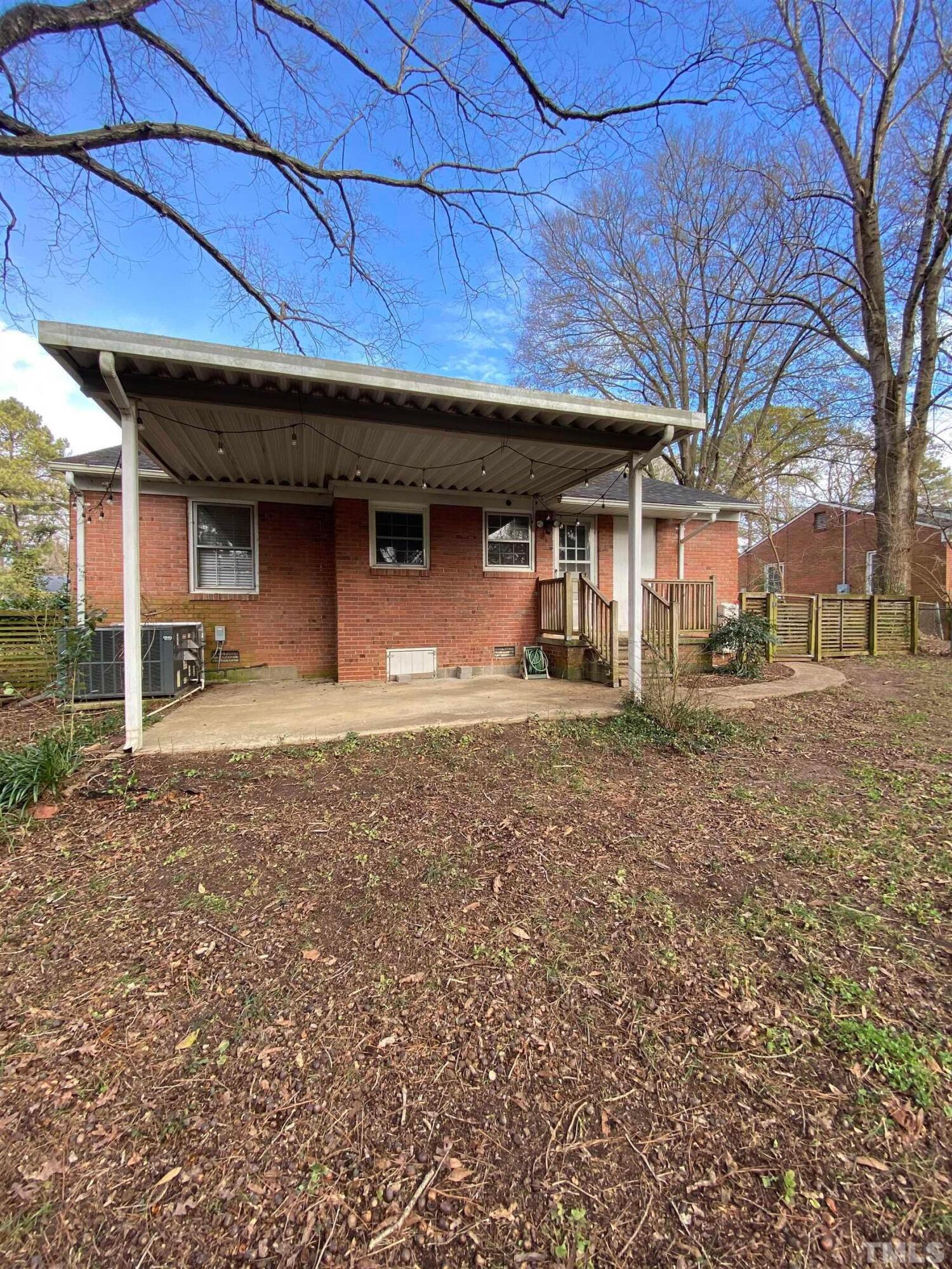 2418 Stevens Road Raleigh, NC 27610 - Photo 6 of 17 a front view of a house with a yard