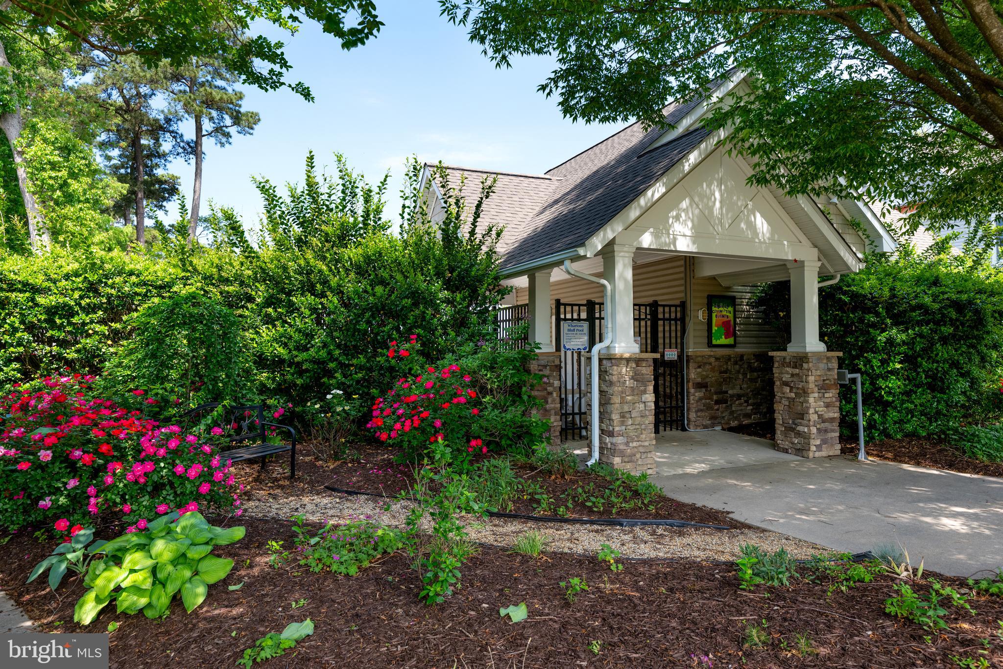 10023 Iron Pointe Drive Extension, Unit 201B2 Millsboro, DE 19966 - Photo 38 of 41 a front view of house with yard