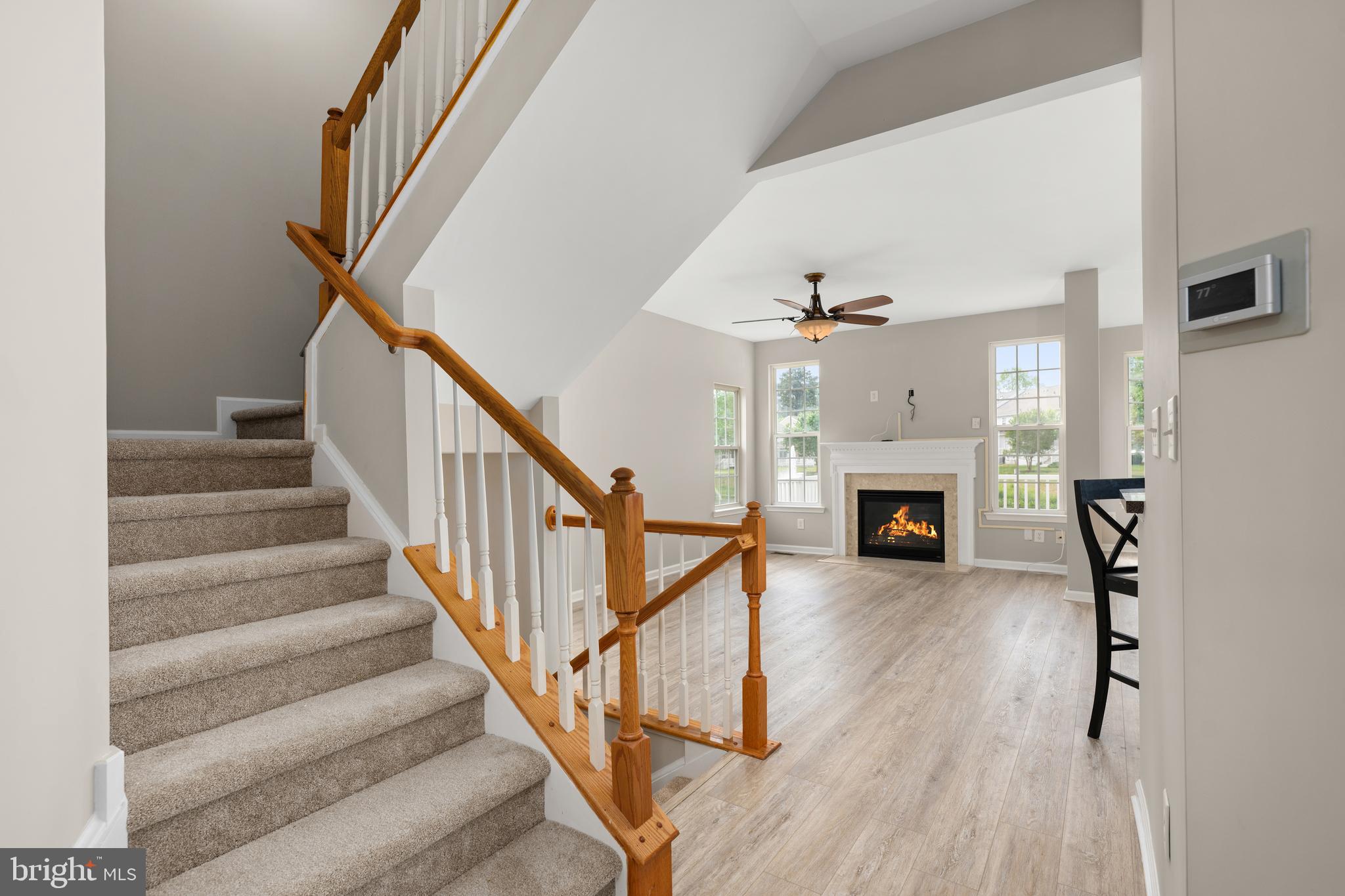 10023 Iron Pointe Drive Extension, Unit 201B2 Millsboro, DE 19966 - Photo 4 of 41 a view of entryway and hall with wooden floor