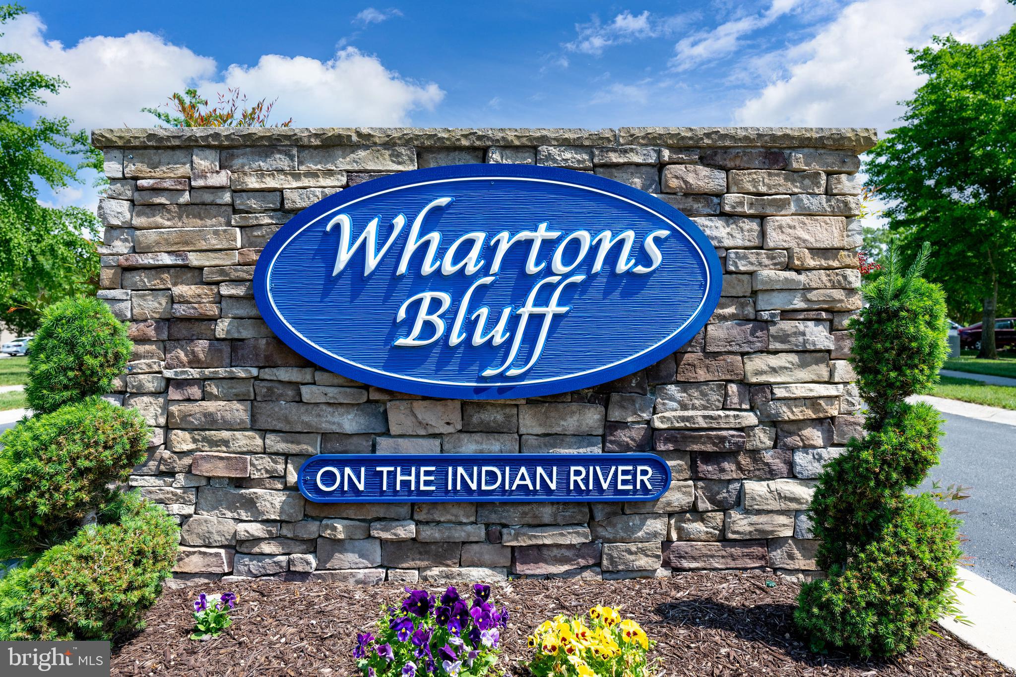 10023 Iron Pointe Drive Extension, Unit 201B2 Millsboro, DE 19966 - Photo 41 of 41 a sign that is on a pole