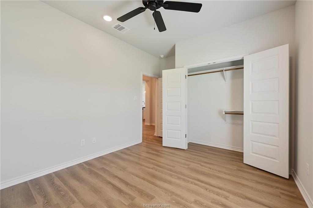 3124 Tarleton Court Bryan, TX 77808 - Photo 16 of 22 wooden floor in an empty room