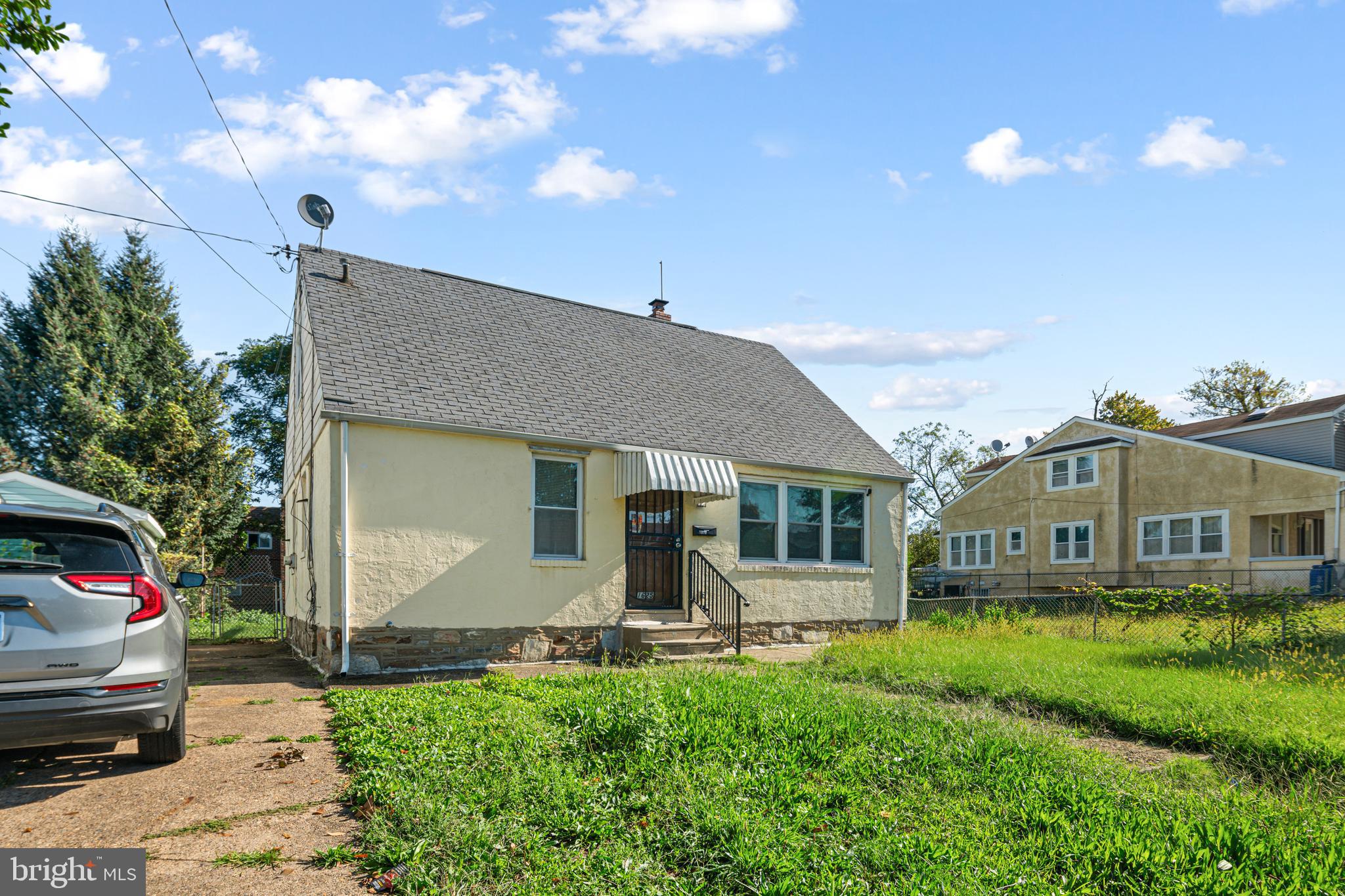 1625 Rhawn Street Philadelphia, PA 19111 - Photo 2 of 15 a view of a house with a backyard