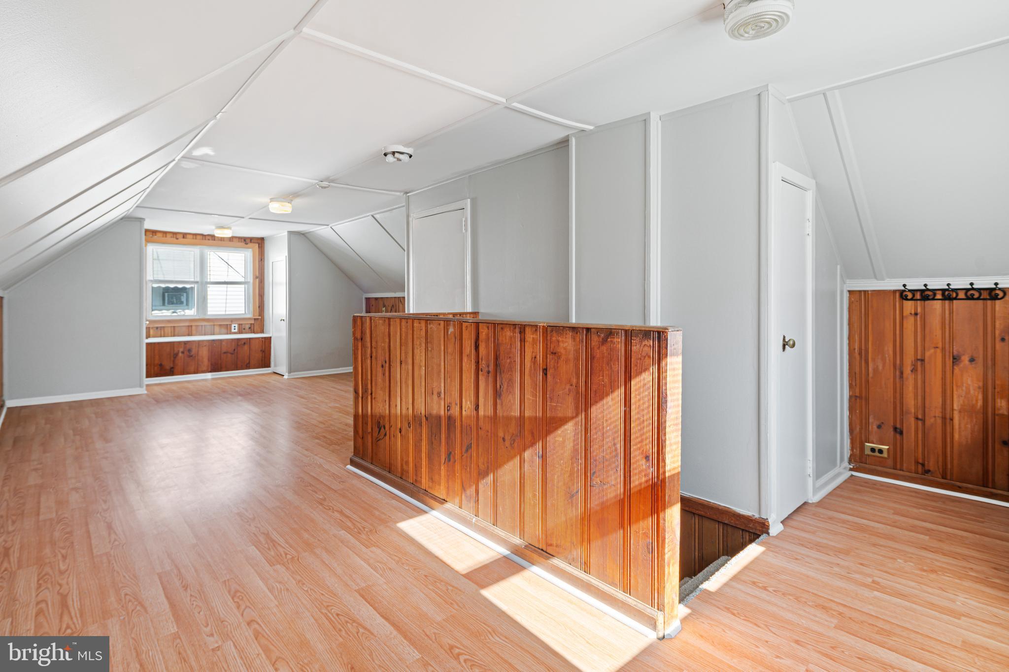1625 Rhawn Street Philadelphia, PA 19111 - Photo 9 of 15 a view of a hallway with wooden floor and stairs