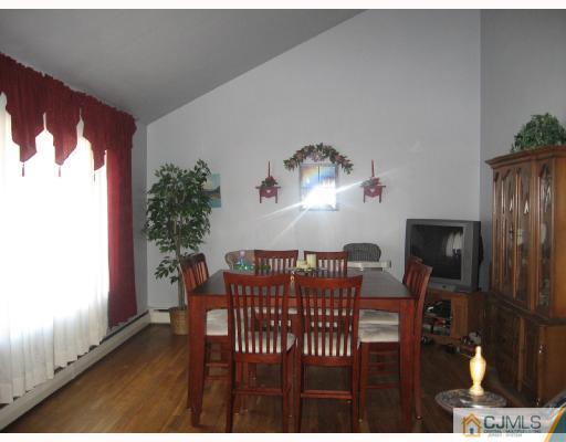 50 Eardley Road Edison, NJ 08817 - Photo 2 of 8 a view of a dining room with furniture window and outside view