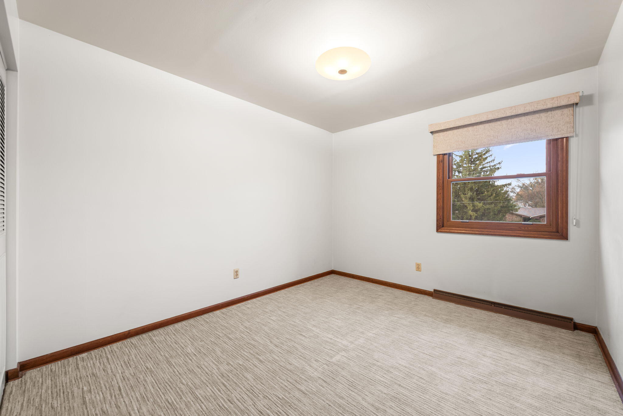 2595 West 65th Avenue Merrillville, IN 46410 - Photo 29 of 36 an empty room with a window