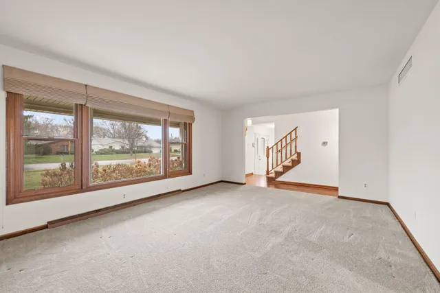 an empty room with window