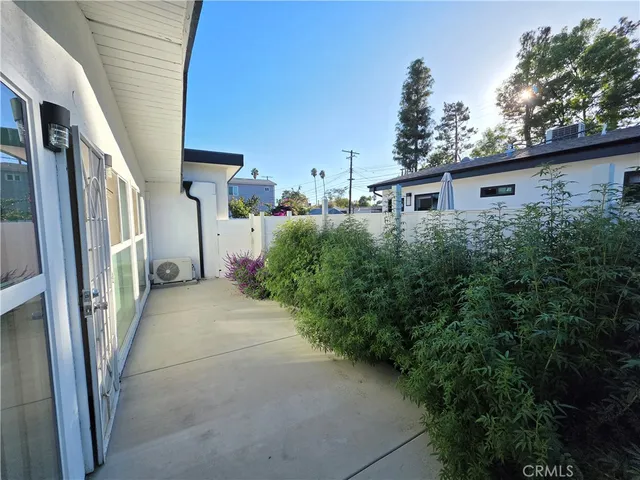 a view of a back yard of the house