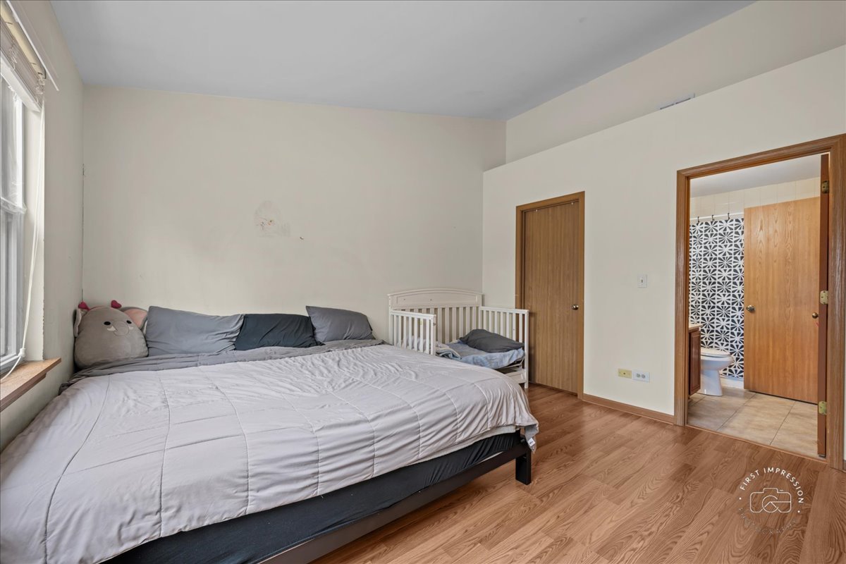362 Chaparral Court Elgin, IL 60120 - Photo 5 of 15 a bedroom with a bed and a window