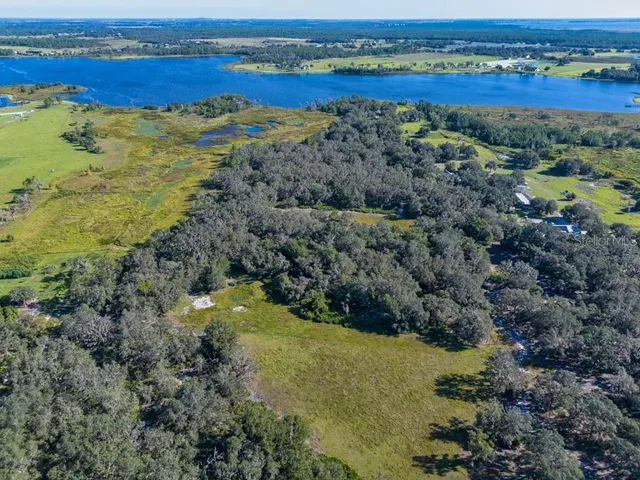 a view of a city with an ocean beach