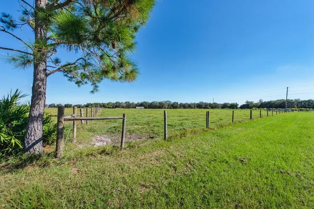 a view of a lake with a outdoor space
