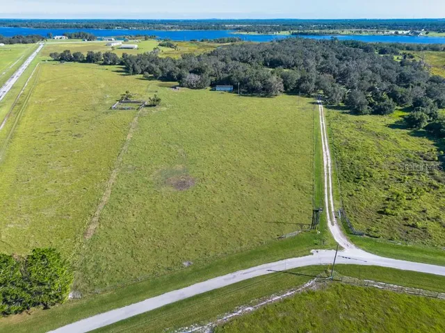 a view of a lake from a yard
