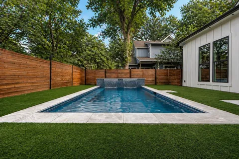 a view of a backyard with a garden