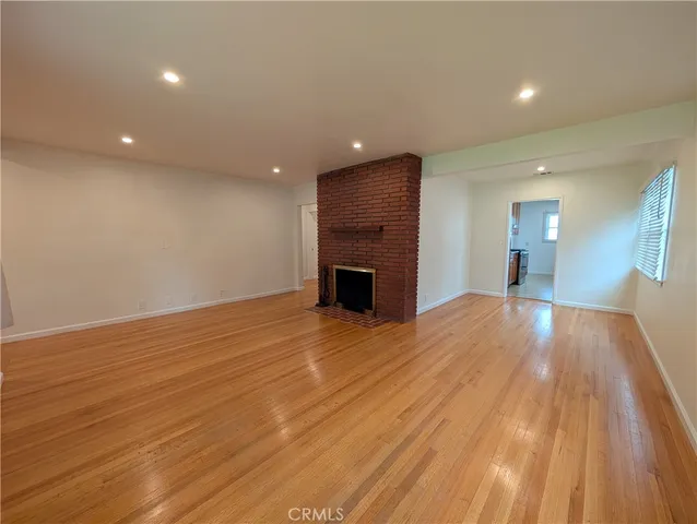 a kitchen with stainless steel appliances granite countertop sink stove and cabinets