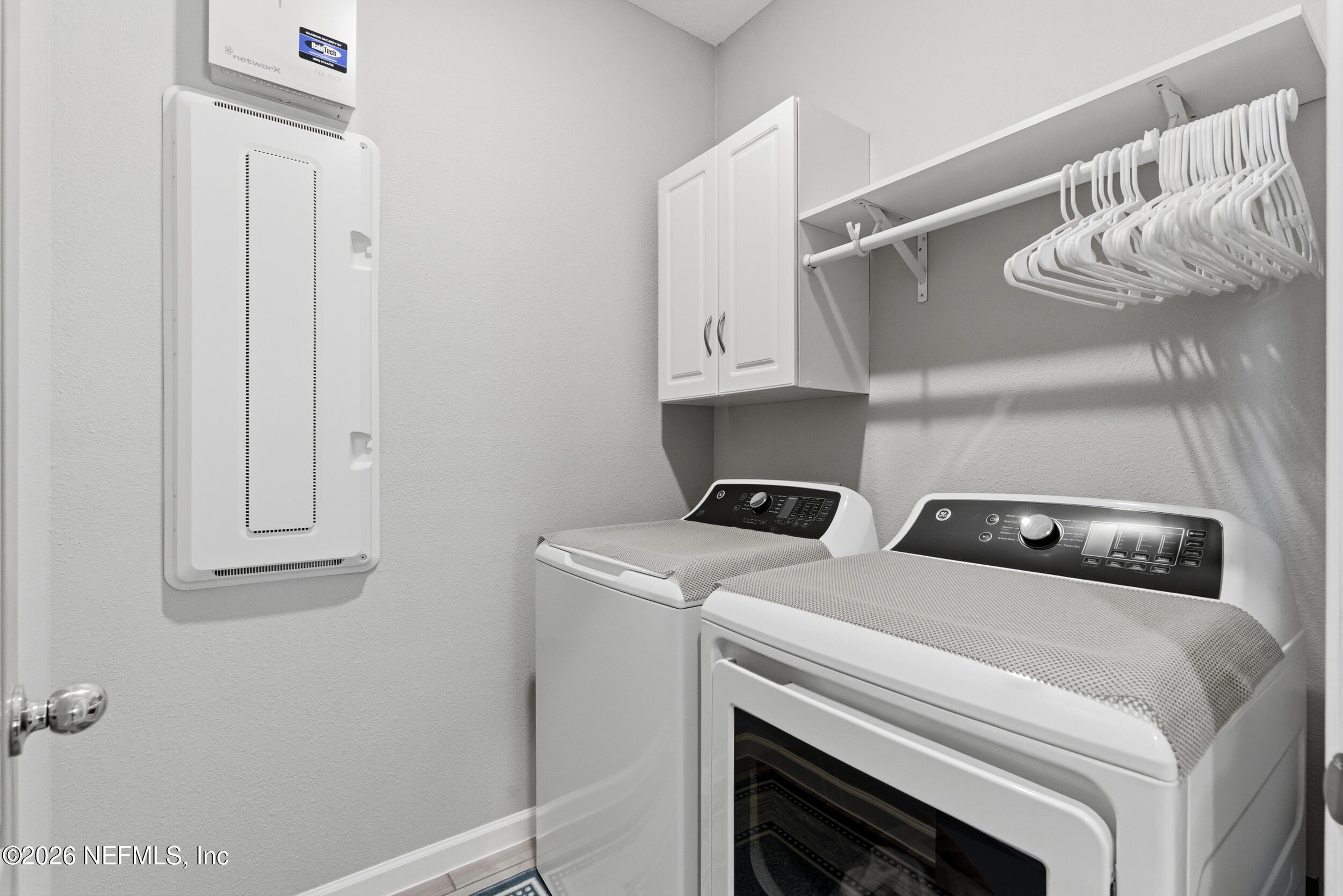 6507 Longleaf Branch Drive Jacksonville, FL 32222 - Photo 17 of 34 a utility room with dryer and washer