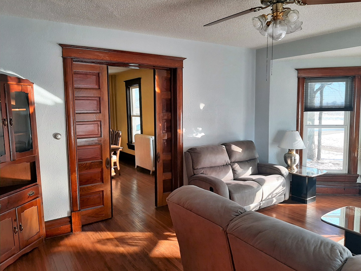 1449 Town Line Road Steward, IL 60553 - Photo 11 of 32 a living room with furniture and a chandelier
