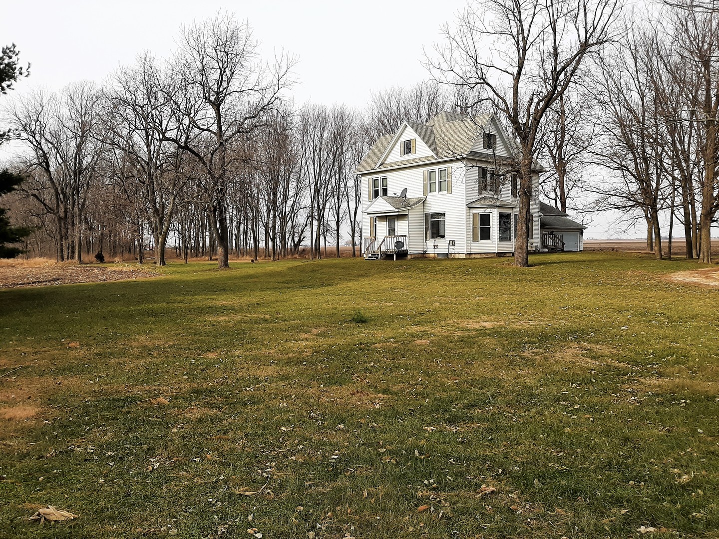 1449 Town Line Road Steward, IL 60553 - Photo 2 of 32 a view of a town with large trees